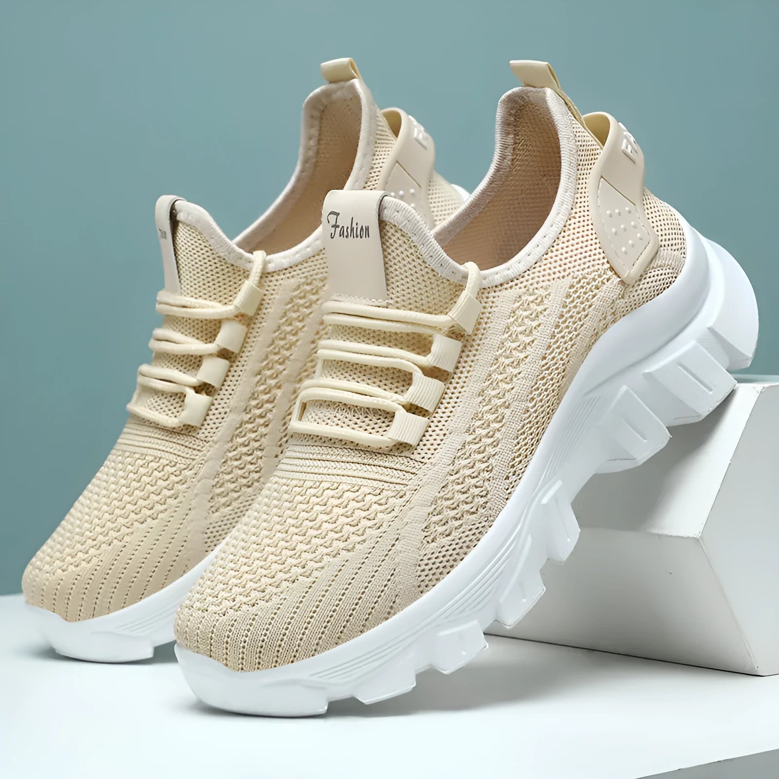 Women's white Flyknit sneaker with thick PVC sole and front lace-up design