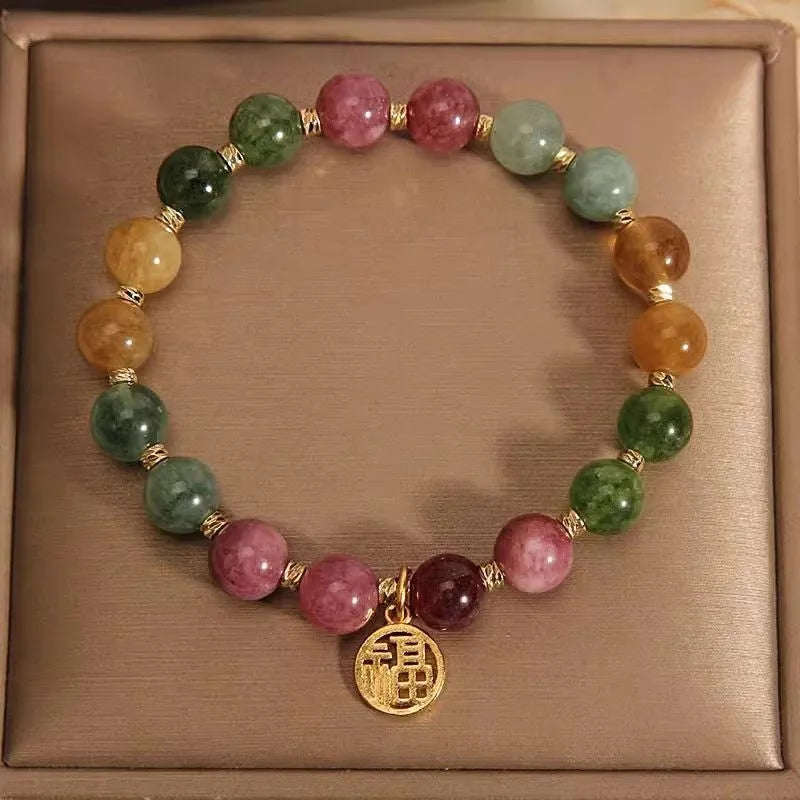 Natural colour tourmaline bracelet with geometric design showing floral or Chinese Fu character options