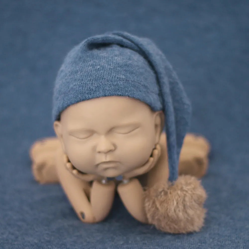 Hand-woven yarn baby photography hat in white with conical crown