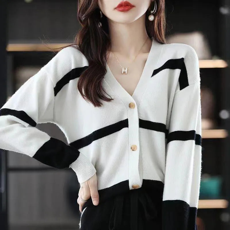 Women's slim fit V-neck cardigan with 3D striped pattern and buttons in four colour options.