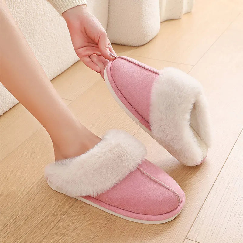 Women's brown plush indoor slippers with round toe, flat heel, and textured non-slip sole.