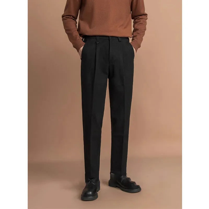 Men's straight-fit polyester trousers in dark grey, laid flat showing waistband and leg cut.