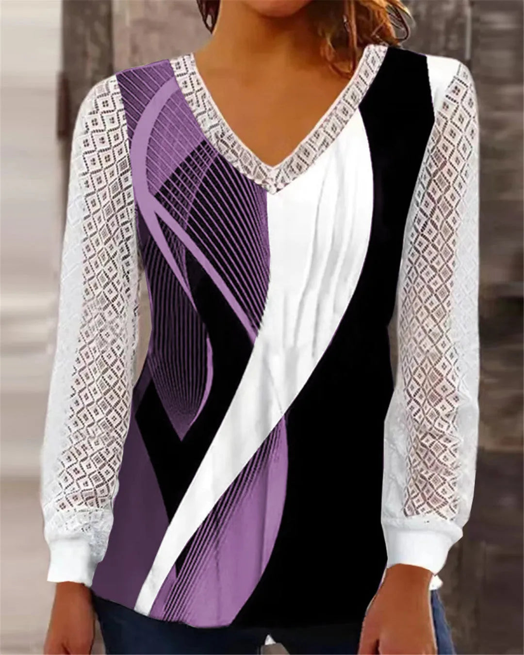 Purple loose V-neck women's top with long sleeves and a hollow-out lace print pattern.