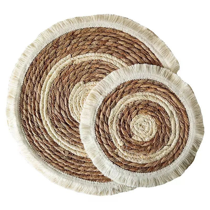 Round Japanese straw placemat with tassel detailing in papyrus material, available in four diameter sizes