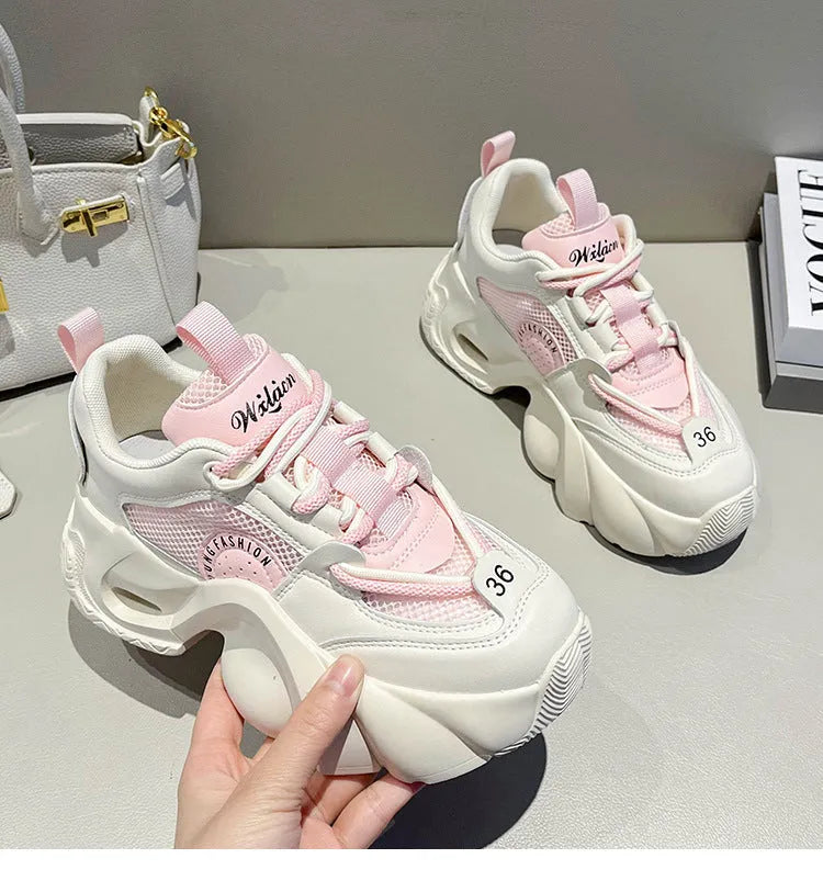Women's pink casual sneakers with cross shoulder straps and thick sole
