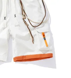 Men's loose-fit bamboo fibre shorts in coffee colour, showing straight-leg cropped design on a hanger.