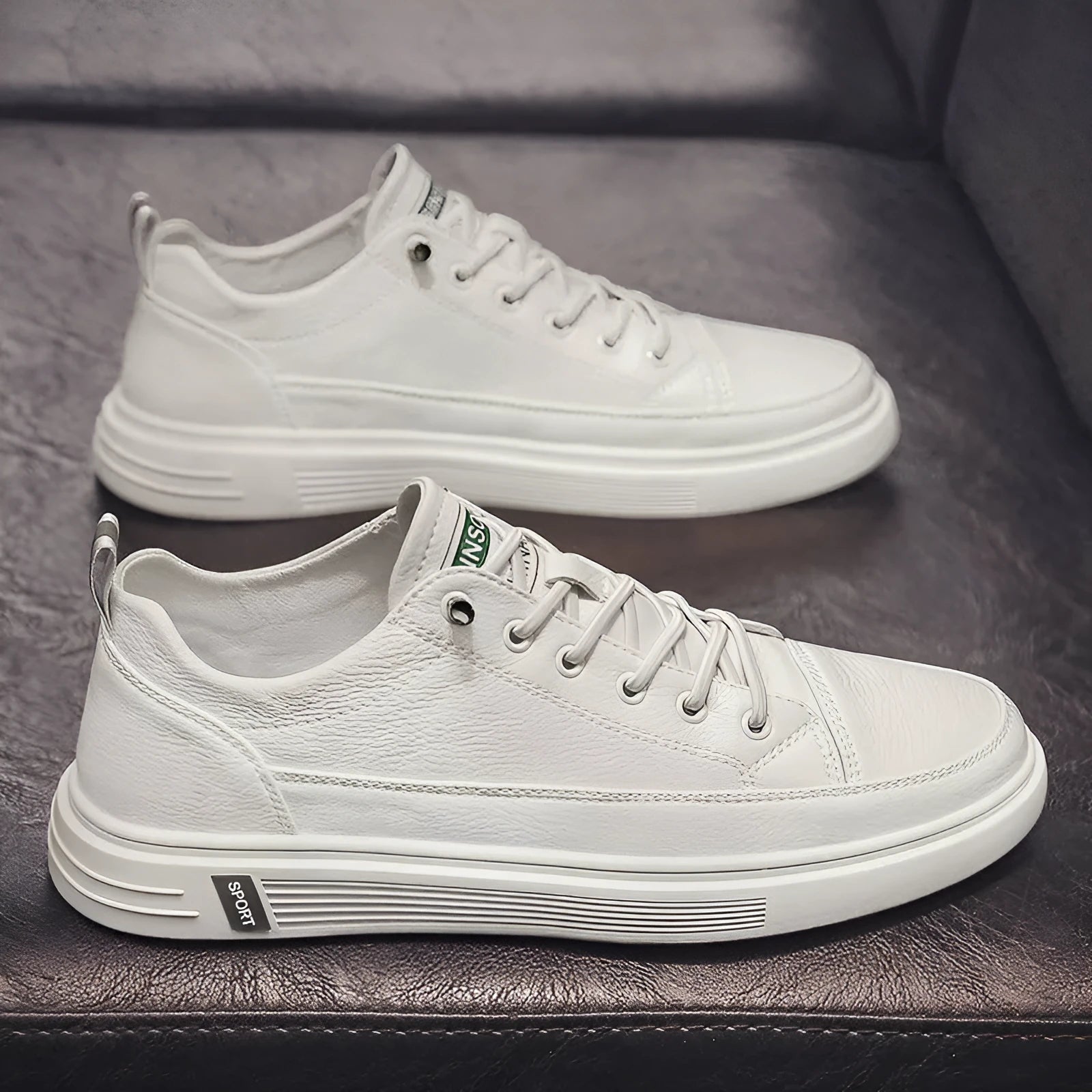 Men's white casual PU shoes with low flat heel and round toe on a plain background