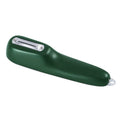 Green vegetable and fruit peeler with a storage tube and stainless steel blade on a kitchen counter.