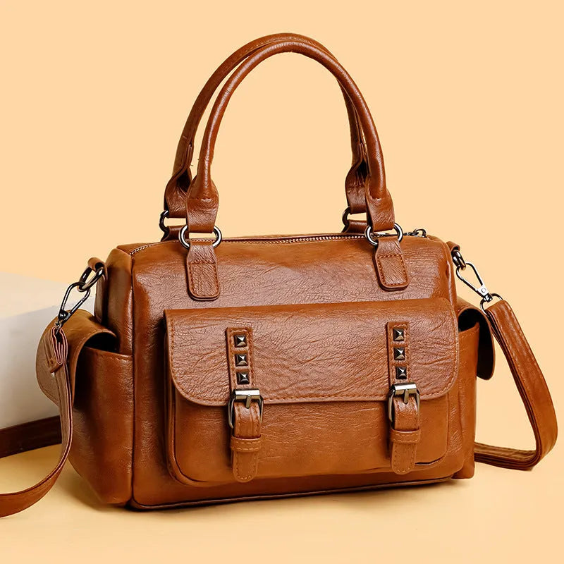 Large vintage messenger bag in horizontal square shape with contrast stitching, shown in available colour options