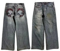 Men's grey washed-out wide-leg jeans with a straight cut and mid-rise waist on a mannequin.