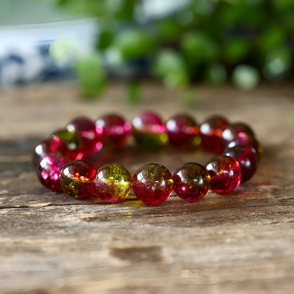 Women's watermelon crystal bracelet showing four size options from 6mm to 12mm diameter