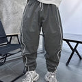 Men's blue bamboo fibre sports trousers with cropped length and elastic waistband
