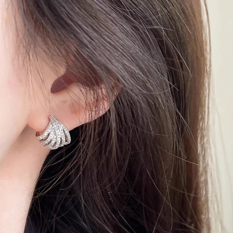 Geometric zircon earrings with platinum electroplating and line design