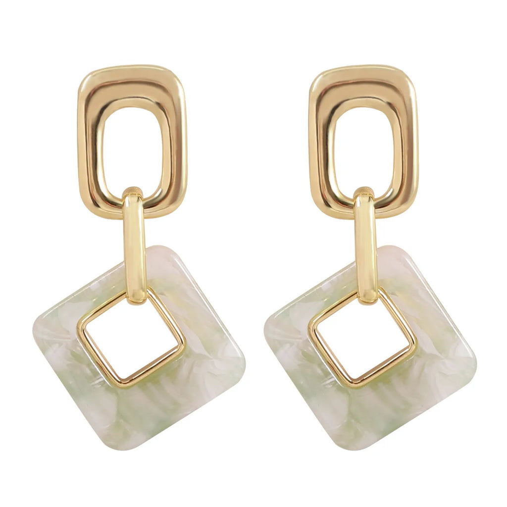 Geometric hollow square earrings with chamfered corners in electroplated copper