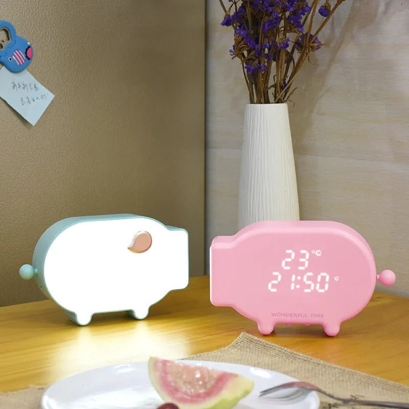 Blue USB-powered LED alarm clock with temperature display and charging functionality