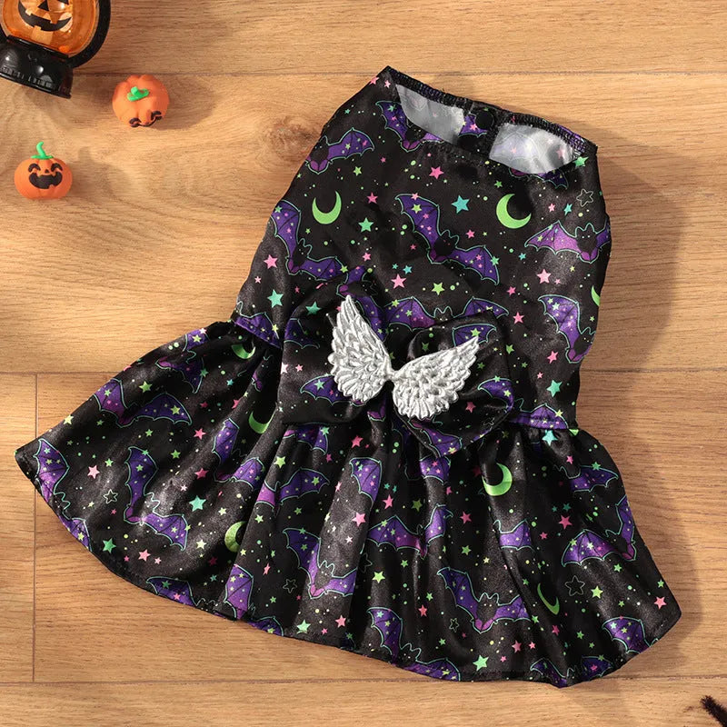 Angel wings Halloween dog costume in bright pumpkin orange and bat pattern colours