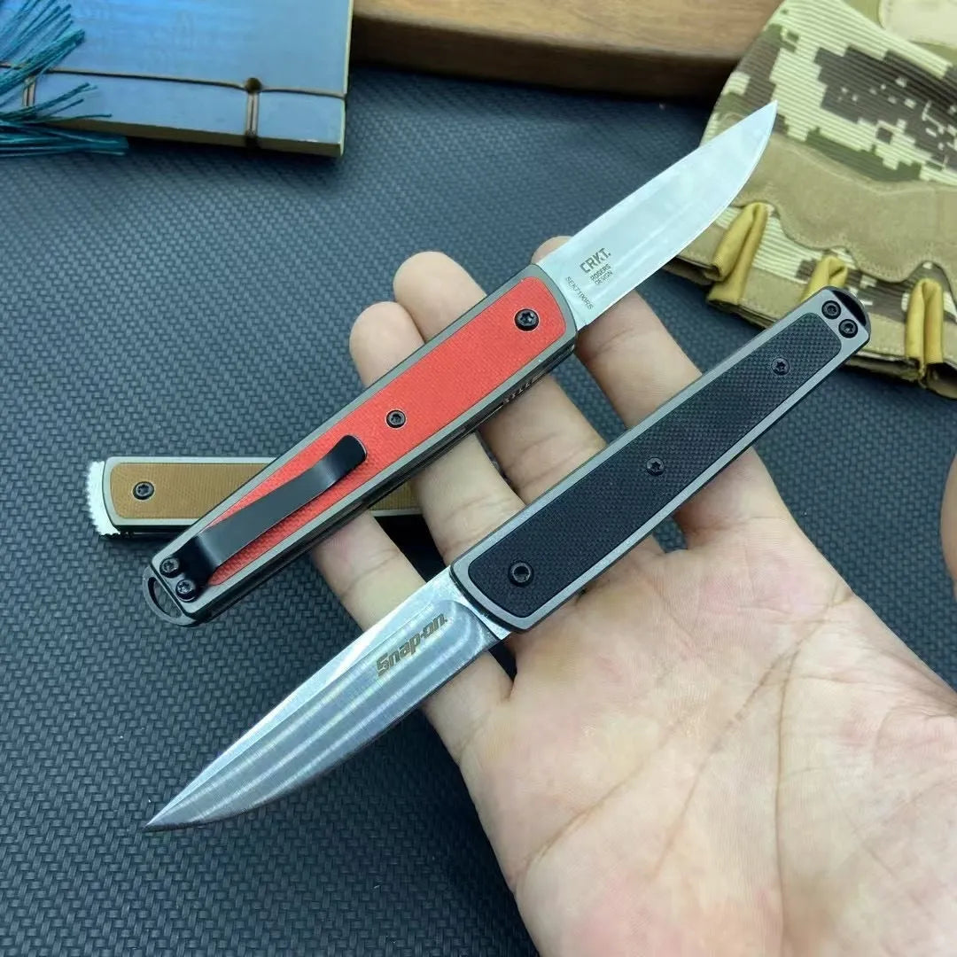 Folding fruit knife with stainless steel blade shown in open position with measurements