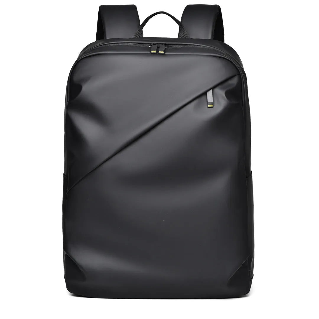 Large waterproof backpack in black with sewing thread detailing and included computer bag
