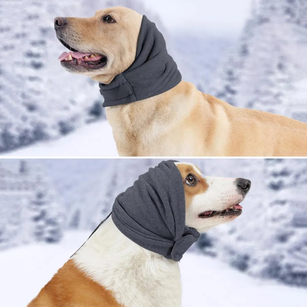 Dog wearing black calming hoodie head cover with ear wraps for noise reduction and anxiety relief