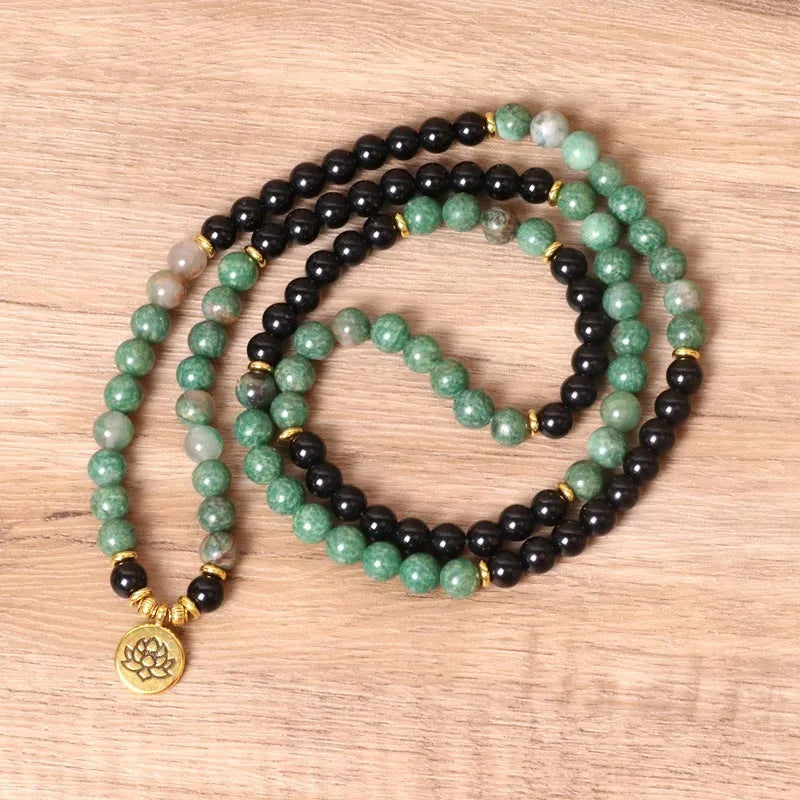 Green and black elastic beaded long bracelet with alloy beads on stretch band