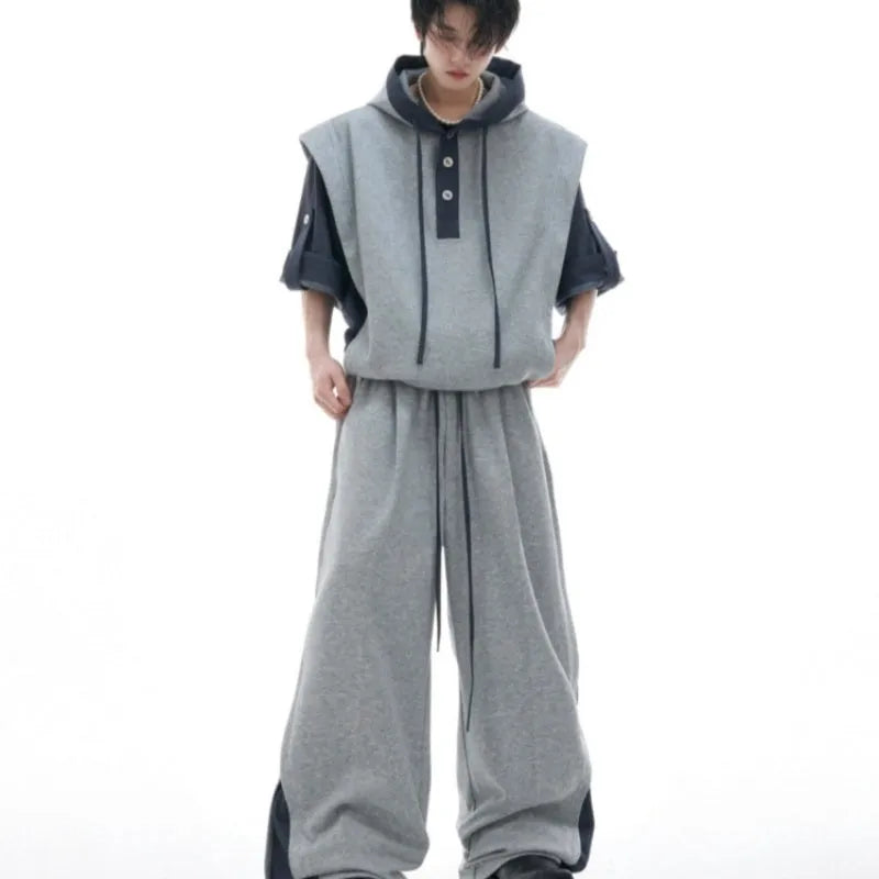Men's hooded polyester tracksuit set with three-dimensional stitching in black or grey colours