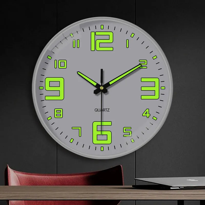 8 inch diameter modern wall clock with luminous hands on a wall.