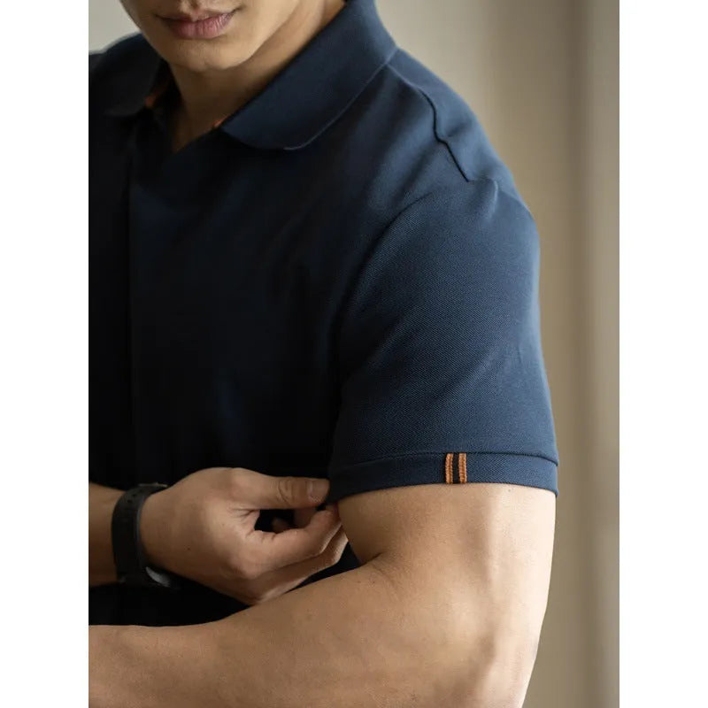 Cotton polyester blend polo shirt in blue colour showing short sleeves and regular cut design