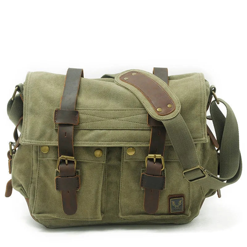 Men's canvas crossbody shoulder bag with cowhide trim showing internal organisers