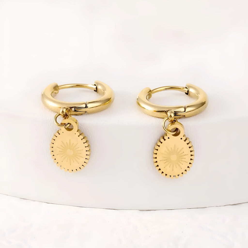 Stainless steel geometric women's ear studs in XY-EH005 colour with ellipse details.