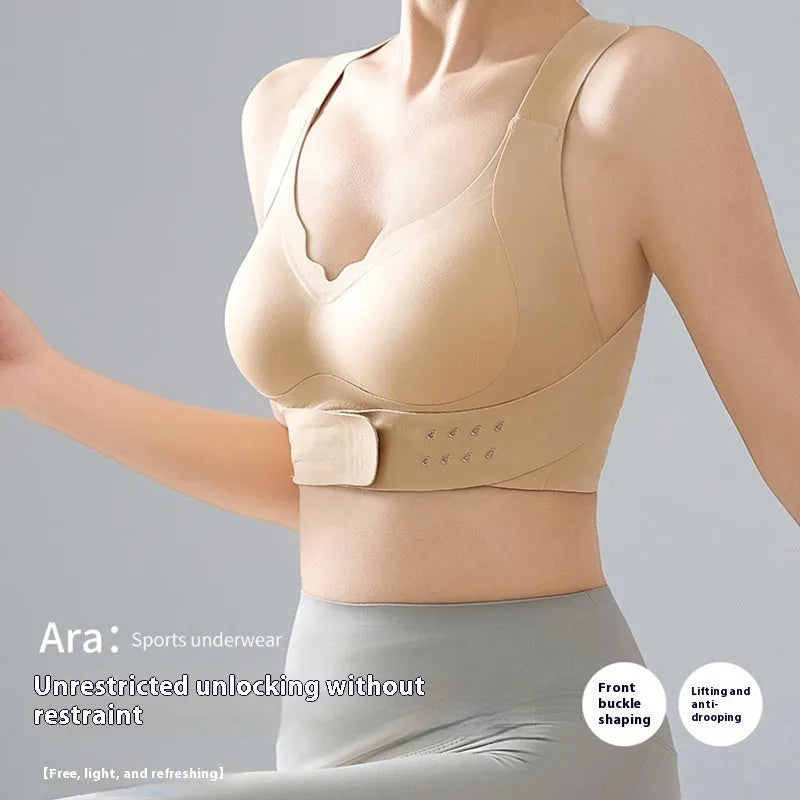 Women's front buckle yoga bra in black, showing back shaping design and adjustable front closure.