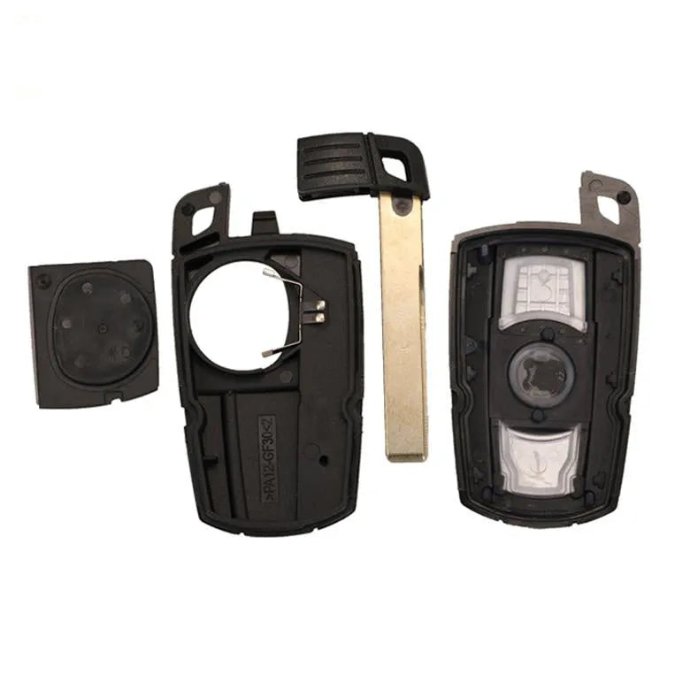 BMW CAS3 remote control key replacement with three keys showing metal and plastic construction