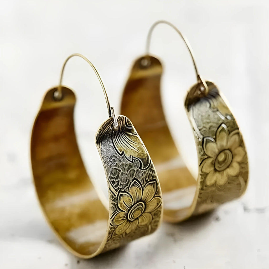 Gold alloy geometric petal earrings with hollow pattern and Maillard style for women