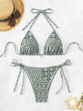 Women's green split bikini bandage swimsuit with side stitching and adjustable straps