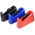 Dual-purpose tape cutter with PS body and stainless steel blade on a desk