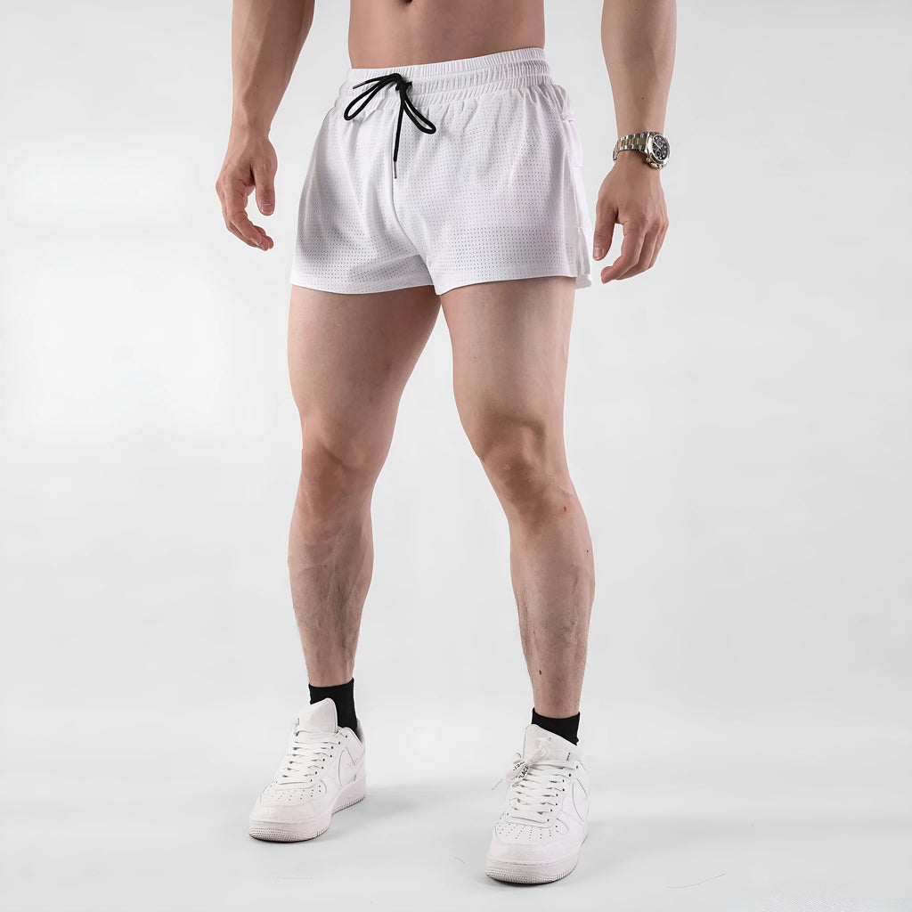 Men's black and white nylon shorts with a mid-waist design for summer sports.