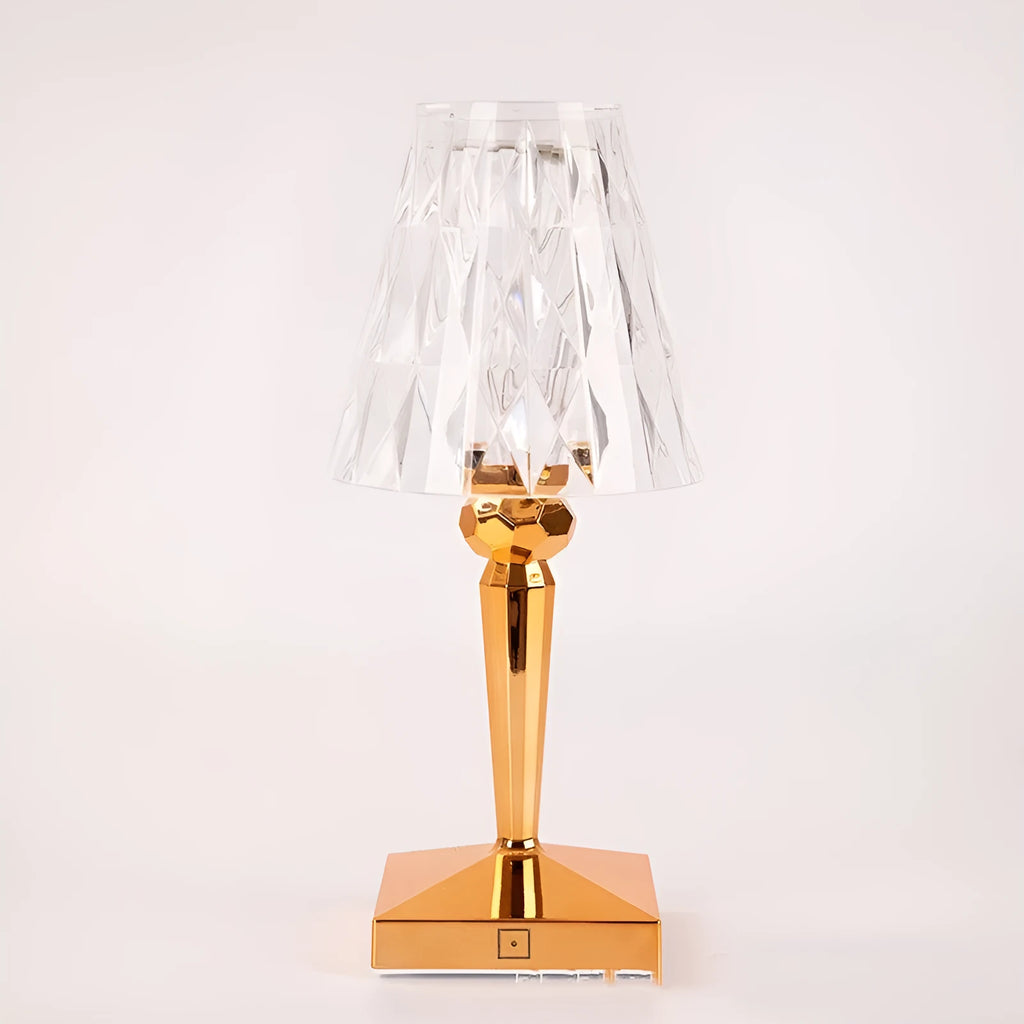 Rose gold plated portable touch control night light on a surface, showing its cubic base and height.