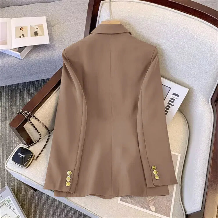 Women's loose fit black polyester blouse with regular sleeves and a slimming silhouette