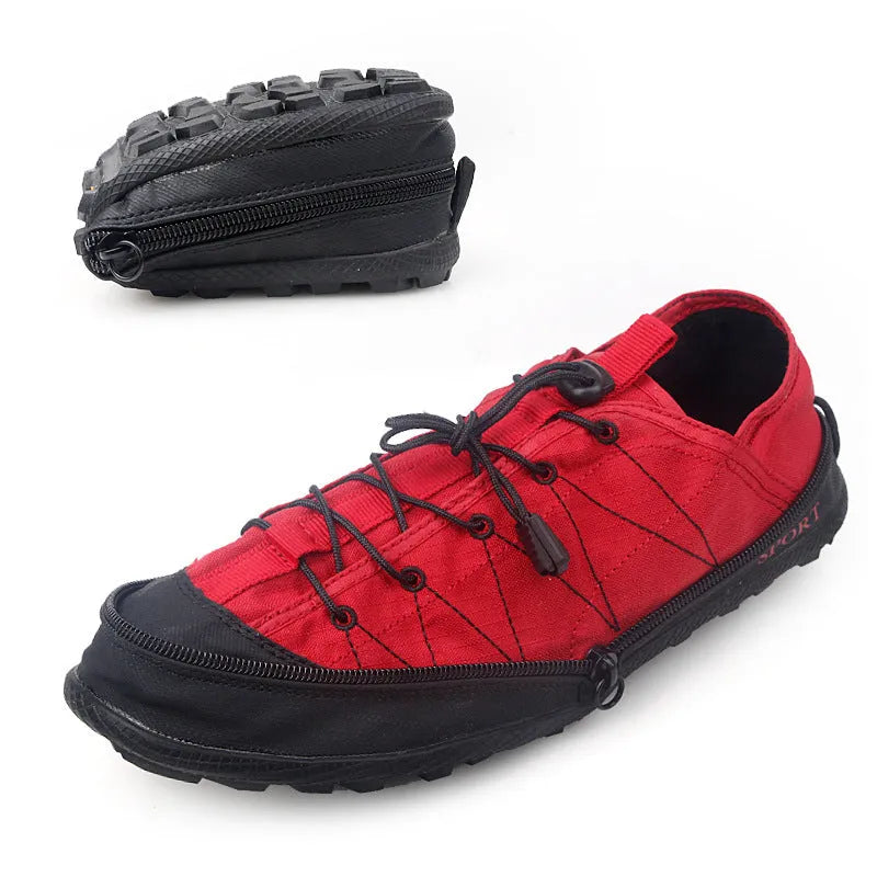 Orange, black, and grey folding outdoor hiking shoes with side zipper, shown in a compact, folded state.