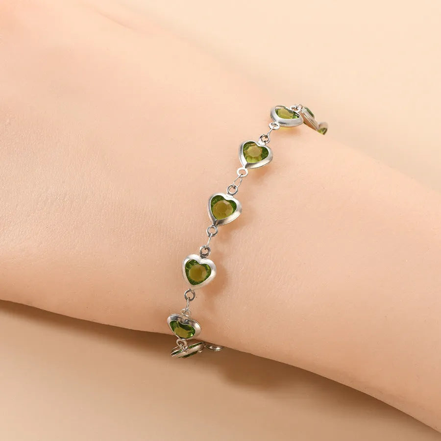 Devil's Eye Creative All-match Fashion Heart Bracelet in stainless steel on a wrist.