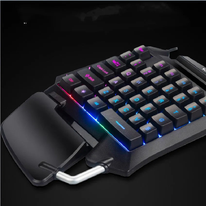 Black left-handed one-handed USB gaming keyboard with integrated hand rest for desktop PCs.