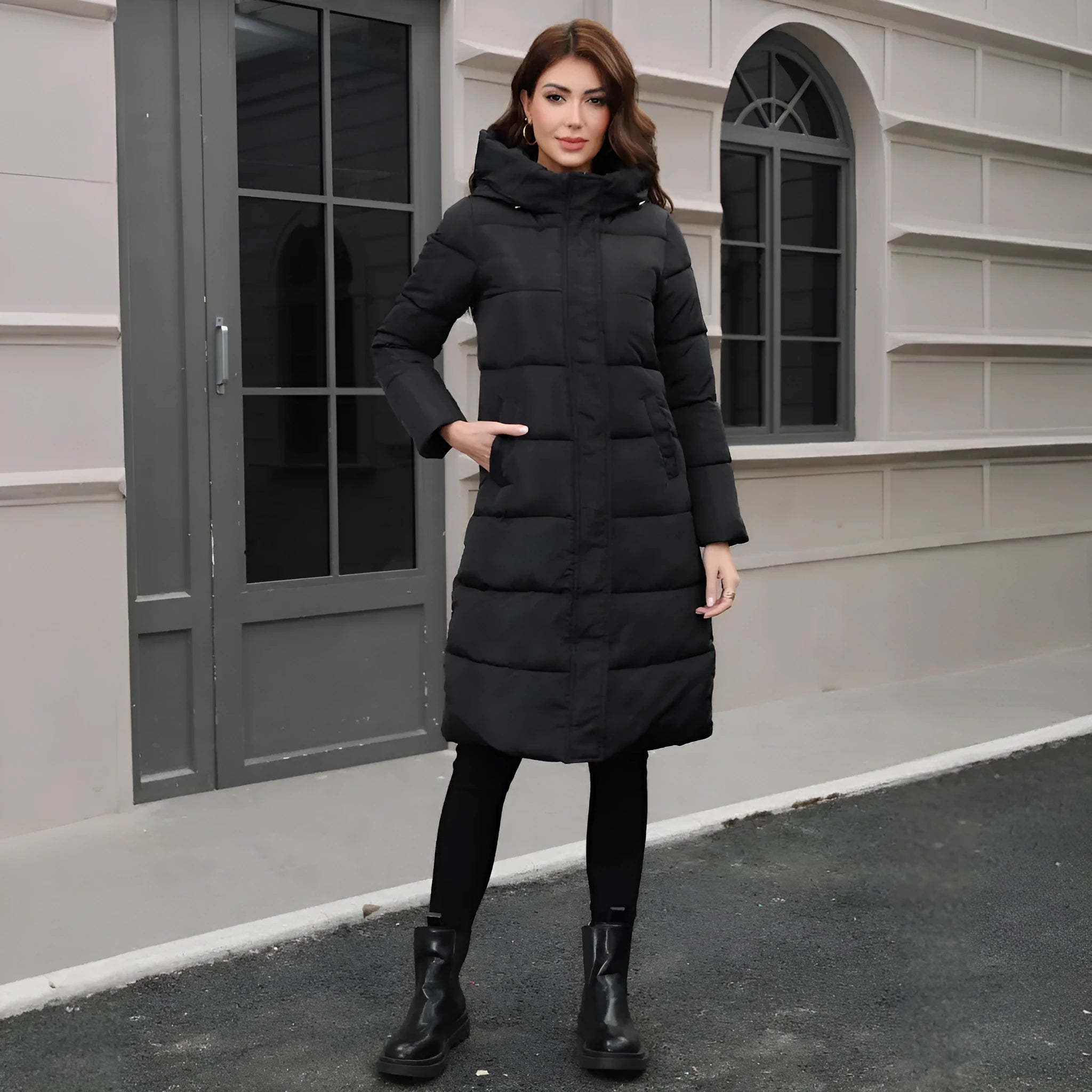Black hooded slim-fit long jacket with a zip front and fleece lining.