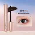 Long curling and long-lasting mascara tube in black or brown shade with applicator wand.