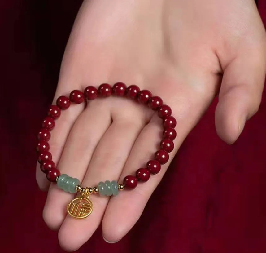 Handmade wave-shaped cinnabar and copper bead bracelet in national style.
