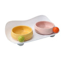 Elevated ceramic pet bowl set in pink with two bowls on a non-slip raised platform.