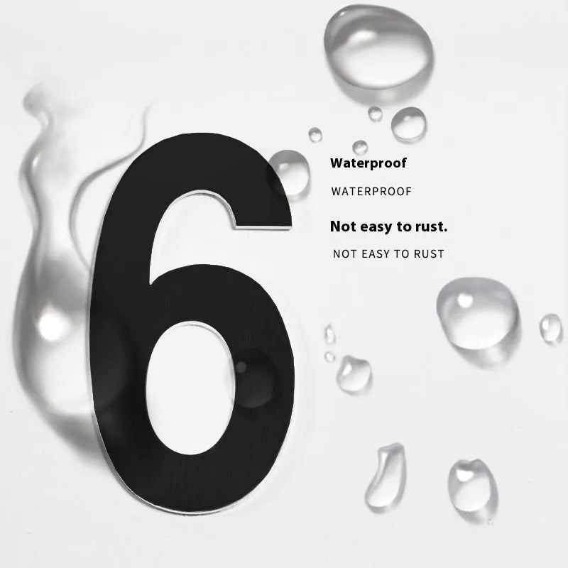 Black stainless steel sticky house number sign with 7.5cm character on adhesive backing