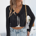 Women's khaki casual coat with lace-up front and hollow-out detail, short length with long sleeves.