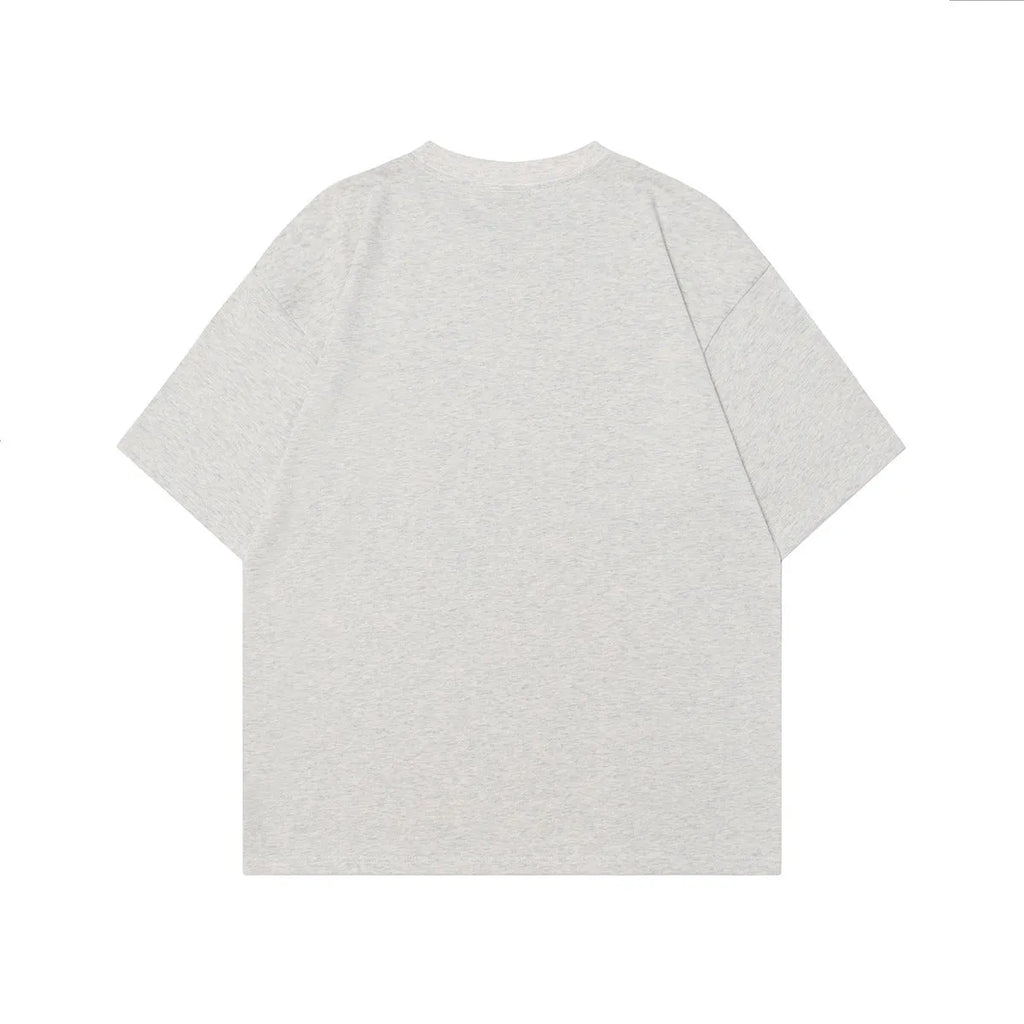Men's grey retro graphic t-shirt with character design, loose fit and short sleeves.