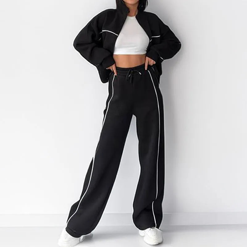 Casual polyester suit with zip hoodie and striped lace-up trousers in apricot colour.
