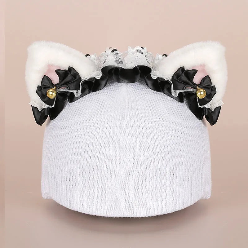 Cute cartoon plush fabric hat cover on a ski helmet for decoration.