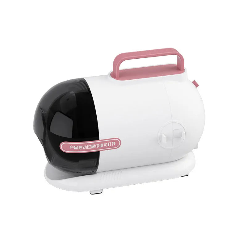 Pink and white multifunctional pet grooming vacuum cleaner with hose, shear, and comb attachments